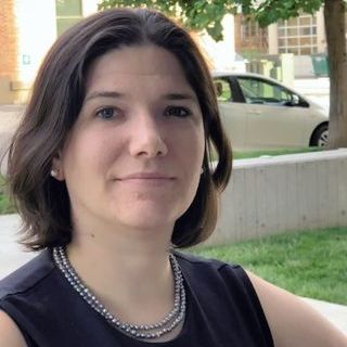 Dr Justine Debelius